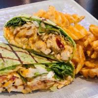 Jwi Wrap · Chicken Strips or Grilled Chicken tossed in your favorite JWI wing sauce, cheese, onion, let...