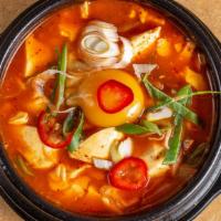 Soon Tofu Soup · Soft tofu stew with choice of seafood, beef, pork, or mushroom.  Choose spice:  white / mild...