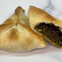 Spinach Boreg · Vegan and delicious, this tangy and slightly spicy spinach turnover is our best seller.