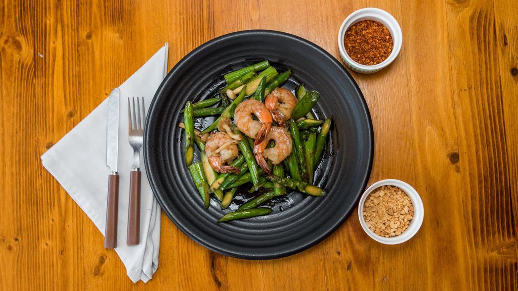 Asparagus With Shrimp · Stir-fried shrimp mixed with asparagus, mushroom, garlic, and cooking wine. Served with white or brown jasmine rice.
