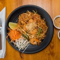 Pad Thai Noodles · Served with salad, crispy spring roll, gyoza, and soup. Choice of white or brown rice.