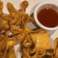 Cream Cheese Wontons · Crispy wontons stuffed with cream cheese served with sweet plum dipping sauce.