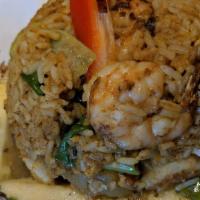 Pineapple Fried Rice · Fried rice with combination of chicken, shrimp, pineapple, cashew nuts, onions, scallions, a...