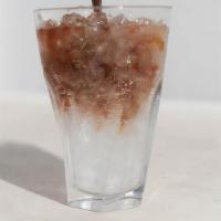 Fizzy Americano · A single origin espresso shot served over our cask-conditioned sparkling water.