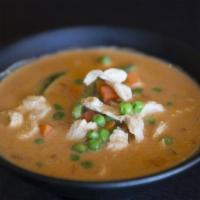 Red Curry · Red curry in coconut milk with choice of meat, bamboo shoot, bell pepper, and basil leaves. ...