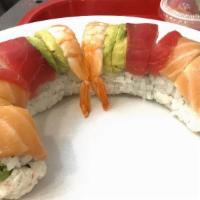 Rainbow Roll · Inside crab meat, cucumber, avocado. Outside tuna, salmon, white fish, shrimp, albacore, avo...