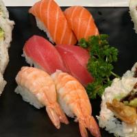 Combo B (Dinner) · 8 pcs Cali Roll, 5 pcs Crunch Rollm, 2 pcs Ebi sushi, 2 pcs Tuna sushi, 2 pcs Salmon sushi