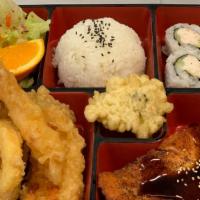 (Lunch) Miyako Special Salmon ) · Salmon Teriyaki . 4 pcs of Cali Roll & Shrimp & Vegetable Tempura.rice , miso soup , lettuce...