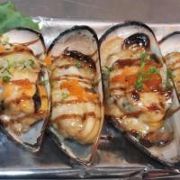 Baked Green Mussel · 6 Pcs mussel topped with masago,eel sauce,mild spicy mayo and green onion.