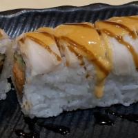 Volcano Roll · Baked white fish on spicy tuna roll.