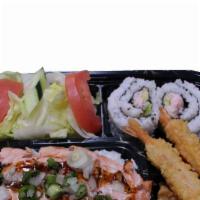 Salmon Teriyaki Bento Box · Salmon teriyaki, rice, salad, 4pc California roll, 2pc gyoza, 2pc shrimp tempura.