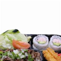 Beef Teriyaki Bento Box · Beef teriyaki, rice, salad, 4pc California roll, 2pc gyoza, 2pc shrimp tempura.