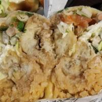 Fish  Burrito · Battered fish wrapped in a flour tortilla and stuffed with beans, rice, cabbage, onions, tom...