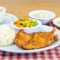 Fried Chicken Breast Dinner · 6 oz chicken breast served with whipped potato, daily veg or cole slaw, soup, roll and slice...