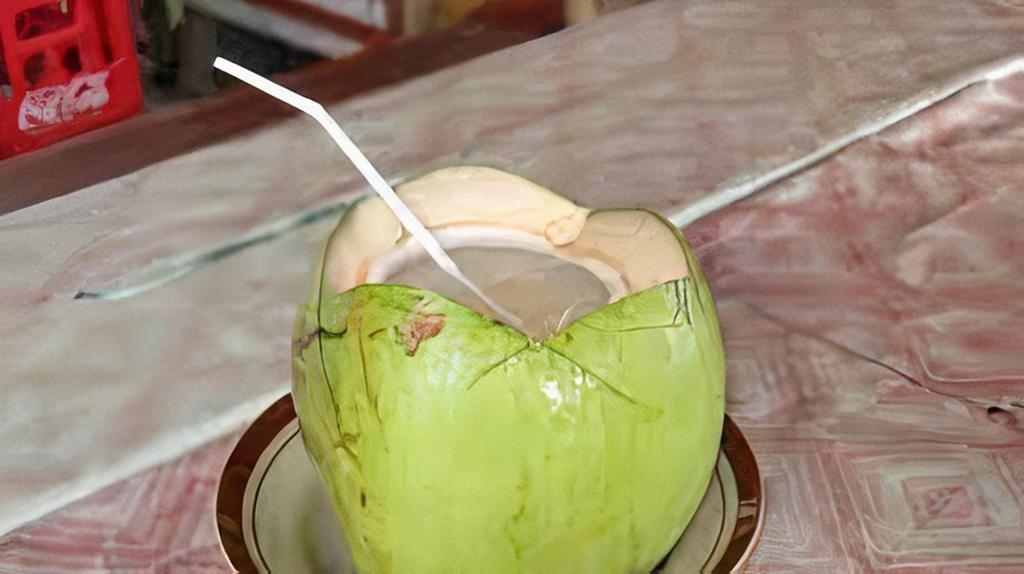 Coconut Juice · Fresh coconut juice with coconut meat over ice.