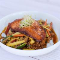 Asian Salmon Bowl · Pan seared Scottish salmon, sautéed vegetables with shiitake mushrooms, bok choy, in a ginge...