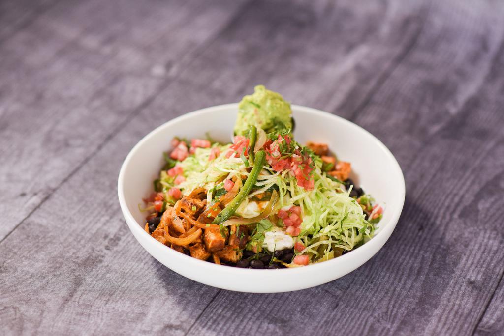 Skinny Protein Bowl · Cage free egg whites, grilled chicken in roasted tomato jalapeÃ±o sauce, over black beans, topped with chopped lettuce, guacamole, pico de gallo and jalapeÃ±os.