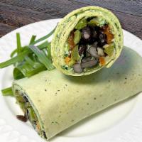 Veggie Fajita Spinach Wrap · A delicious spinach tortilla wrap of butternut squash, yam, fresh spinach, black beans, and ...