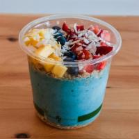 Blue Hawaii Smoothie Bowl · Crafted with Almond Milk, Banana, Blue Spirulina, Mango, Pineapple, Date, and Coconut Butter...