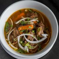 Beef Stew (Bo Kho) · 24 oz of tender beef and carrot in a savory, soy-based broth. Served with a baguette, noodle...