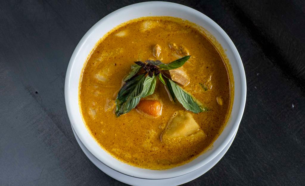 Cambodian Curry · 24 oz of Boneless chicken, potato & carrot simmered in red curry & coconut milk, served with rice, noodle or baguette.