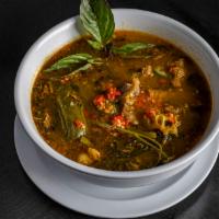 Sour Beef Soup · traditional sour & savory Cambodian soup with tender beef chunks, tripe & fresh veggies; ser...
