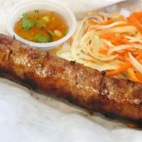 Lao Pork Sausage (2) · In house made sausage made with minced pork, lemongrass, galangal, garlic, onion & kaffir li...