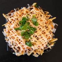 Blvd Fries · Your choice of meat on top of a bed of fries. Topped with shredded cheese, pickled carrot & ...