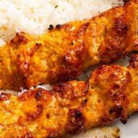 10 Skewers Of Persian Koubideh (Chicken) · Served with Rice, Pita Bread and Grilled Tomatoes