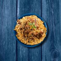 Aromatic Goat Biryani  · Long grain imported 'basmati' rice layered with a curry of bone-in goat meat cooked in our f...
