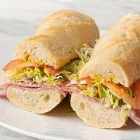 Salami Genoa · all sandwiches come with:
lettuce, onions, tomato, Italian dressing, mayo,  mustard, salt & ...