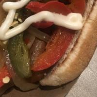 B. Street Dawg · Vegan frank, vegan mayonnaise, grilled onions, grilled red bell pepper, and grilled jalapeño...
