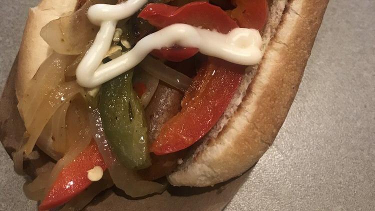 B. Street Dawg · Vegan frank, vegan mayonnaise, grilled onions, grilled red bell pepper, and grilled jalapeños. Vegan.