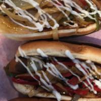 Street Dog · 1/4 lb. Bacon wrapped beef frank, mayonnaise, grilled onions, grilled red bell peppers, and ...