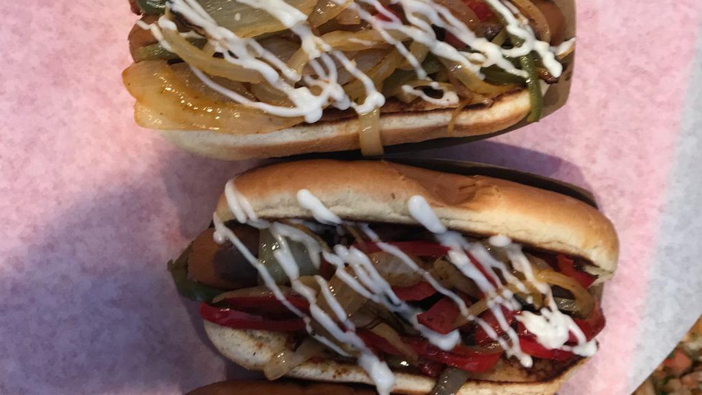 Street Dog · 1/4 lb. Bacon wrapped beef frank, mayonnaise, grilled onions, grilled red bell peppers, and grilled jalapeños.
