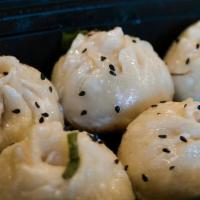 Pan Fried Baby Buns (6) · Shanghai special. Pork buns steamed and then pan fried.