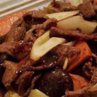 Mushroom Beef · Beef sautéed with mushrooms, celery, and carrots