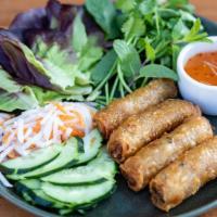 Crispy Imperial Rolls · Crab and shrimp, chicken, or vegetarian. Red leaf lettuce, herbs, cucumbers, pickled root ve...