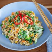 Vietnamese Broken Fried Rice · Broken Jasmine rice tossed with herbs, garlic, scallion, carrot, peas and Gonestraw Farms eg...