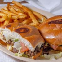 Tortas · Your choice of meat, beans, lettuce, tomatoes, onions, cilantro, and hot or mild sauce now t...