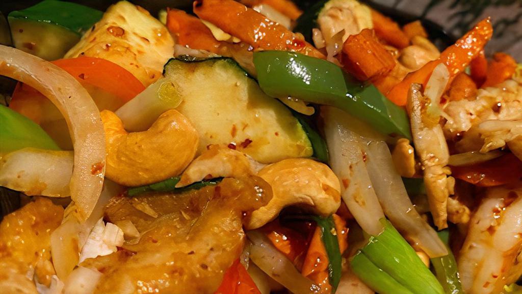 Cashew Nut · Roasted chili paste with onions, green onion, zucchini, carrots, bell peppers, and cashew nuts.