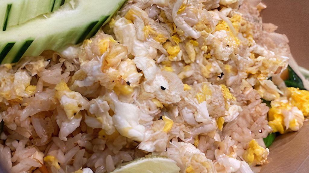 Crab Fried Rice · Jasmine rice with crab meat, egg, peas and carrots, green onion and onion.