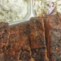 1/2 Rack Of Baby Back Ribs · The filet mignon of ribs. Our premium baby back ribs are seasoned with our secret 
spice-rub...
