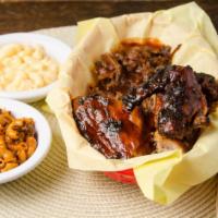 1 Meat Combo · Your choice of one of our signature smoked bbq meats. Served with two homemade sides.