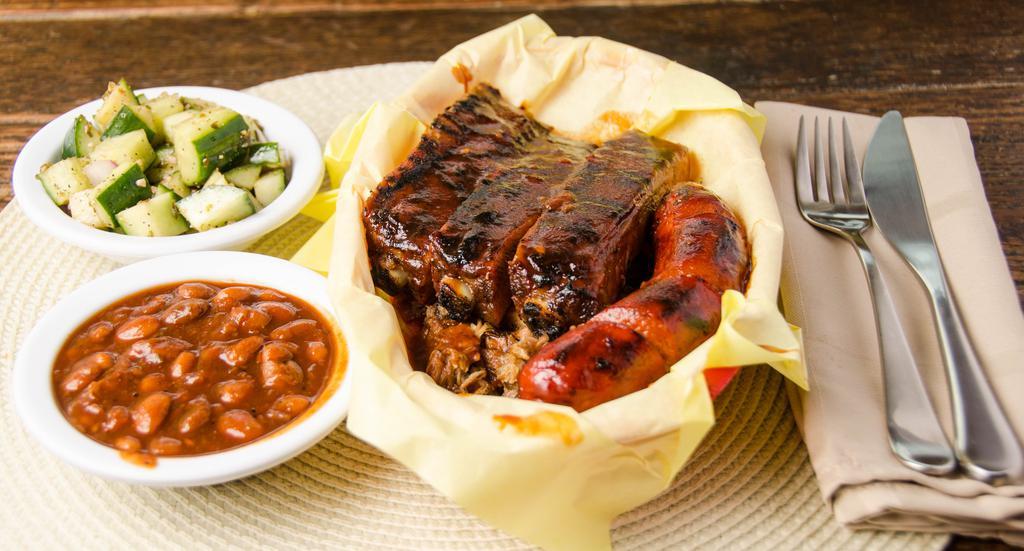 3 Meat Combo · Your choice of 3 of our signature smoked bbq meats. Served With two homemade sides.