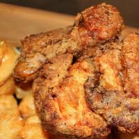 4 Piece Smoke Fried Chicken · 4 pieces of our smoked fried chicken with a basket of Tator tots and a fresh corn bread muff...