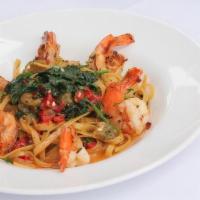Fettuccine Con Gamberetti · shrimp sauteed in chili oil, with fettuccine pasta, roasted bell peppers, spinach, garlic wh...