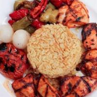 Chicken Kebob · grilled marinated chicken thigh meat served with rice pilaf, bell peppers, grilled tomato, p...