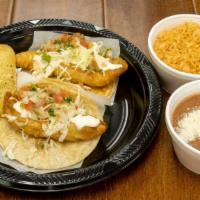 Taco Plate Combo - Fish · Two tacos, rice, beans, and a fountain drink.