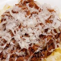 Fettuccine Bolognese · beef ragu' - tossed with butter in parmigiano reggiano. gluten-free pasta available for an a...